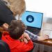 Mother locking on computer for son, parental control