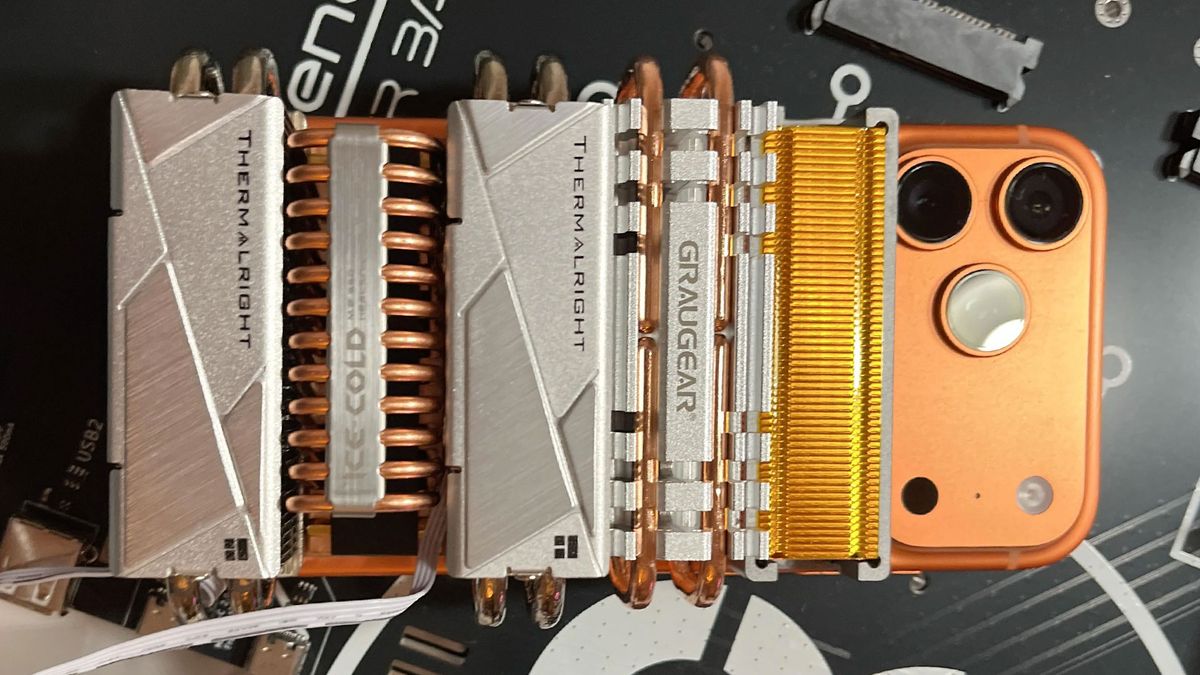 Monstrous SSD cooling solution strapped to iPhone 17 Pro Max