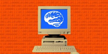 یک کامپیوتر رومیزی قدیمی با پس‌زمینه نارنجی که با کدهای باینری پر شده است و مغز انسان به رنگ سفید روی صفحه نمایش آبی آن نشان داده شده است.