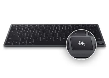 کیبورد هوشمند سامسونگ (Samsung Smart Keyboard) با کلیدهای خاکستری تیره، که یک کلید برجسته با آیکون ستاره‌های درخشان (احتمالاً برای هوش مصنوعی یا میانبرهای خاص) را نشان می‌دهد.