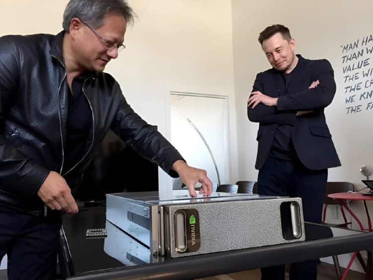 جنسن هوانگ (Jensen Huang) و ایلان ماسک (Elon Musk) در کنار یک ابرکامپیوتر هوش مصنوعی Nvidia.