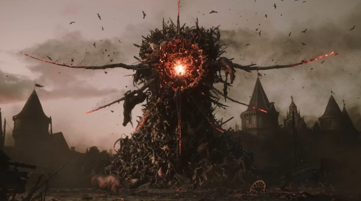 موجود عظیم و هیولایی ساخته‌شده از بقایای انسانی و سازه‌های تیره، با هسته‌ای درخشان در مرکز بدن، در فضایی آخرالزمانی با معماری ویران اطراف