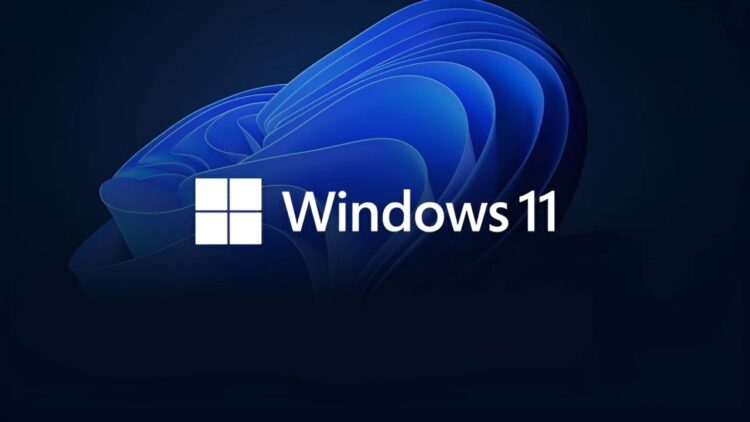 لوگوی Windows 11 در مقابل یک پسزمینه آبی تیره و موجدار.