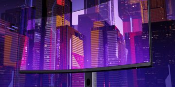 مانیتور گیمینگ خمیده شیائومی در مقابل پسزمینه یک شهر سایبرپانکی بنفش.