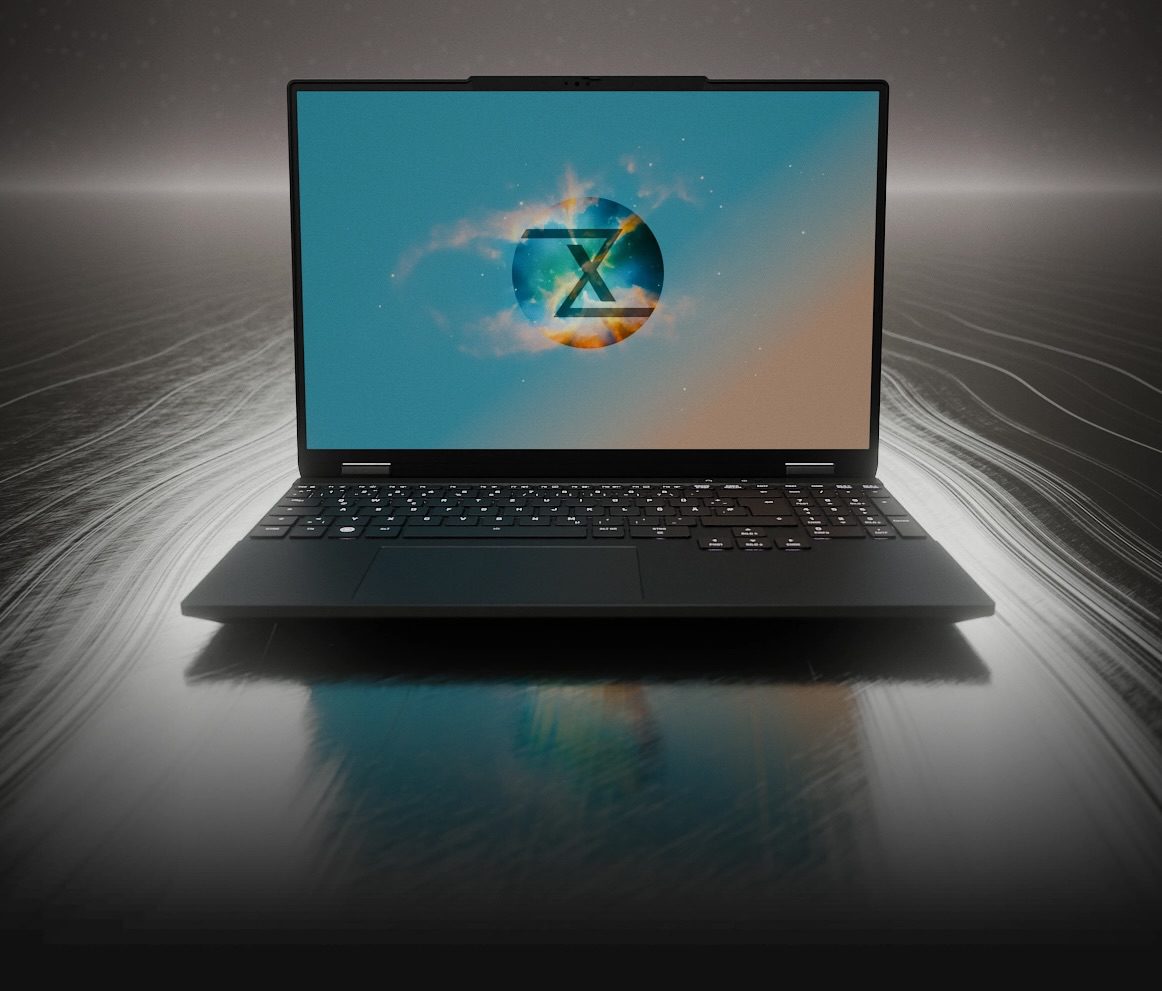 نمای مقابل لپ‌تاپ TUXEDO باز شده روی سطح بازتابنده که لوگوی "X" را در مرکز نمایشگر نشان می‌دهد.