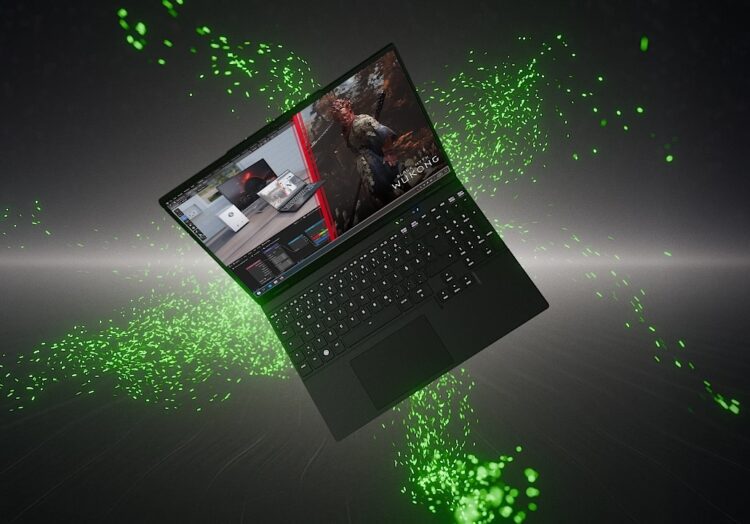 لپ‌تاپ گیمینگ مشکی TUXEDO در حالت معلق با پس‌زمینه ذرات سبز درخشان که بازی Black Myth: Wukong را نمایش می‌دهد.
