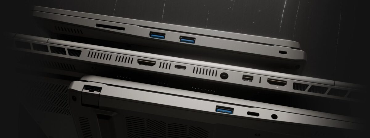 نمای نزدیک از لبه‌های کناری و پشت لپ‌تاپ که درگاه‌های USB، HDMI، Type-C و جک هدفون را نشان می‌دهد.