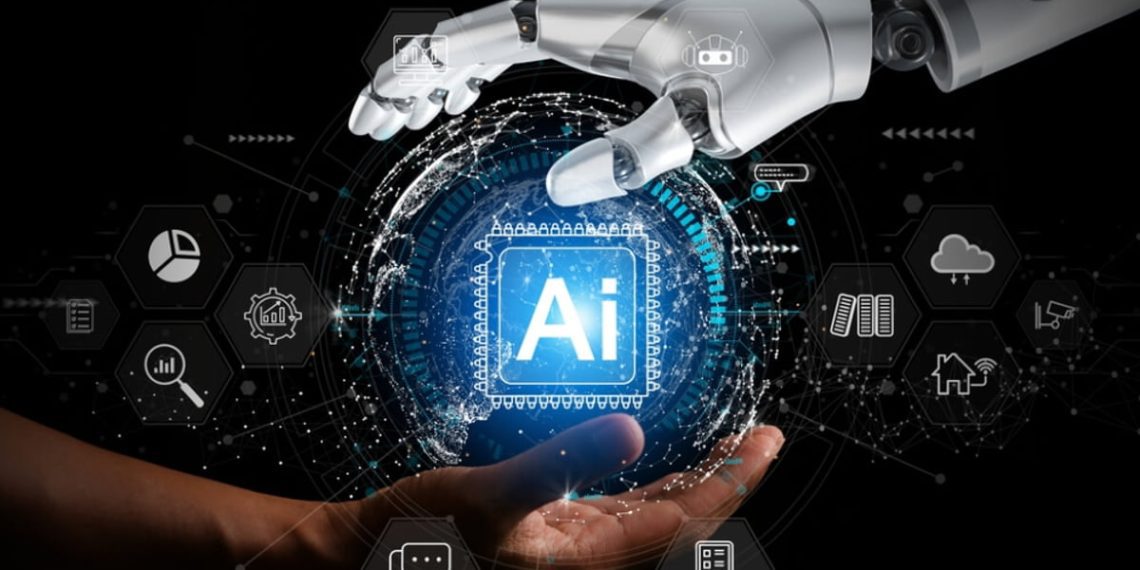 تصویری از یک دست انسان و یک دست ربات که کره‌ای که مرکز آن نوشته شده AI را نگه داشته‌اند.