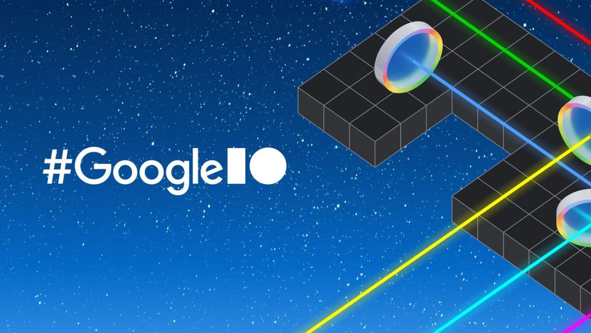 نمای سه‌بعدی از یک بازی پازل با پرتوهای نور رنگی و لوگوی هشتگ GoogleIO در پس‌زمینه ستاره‌ای.