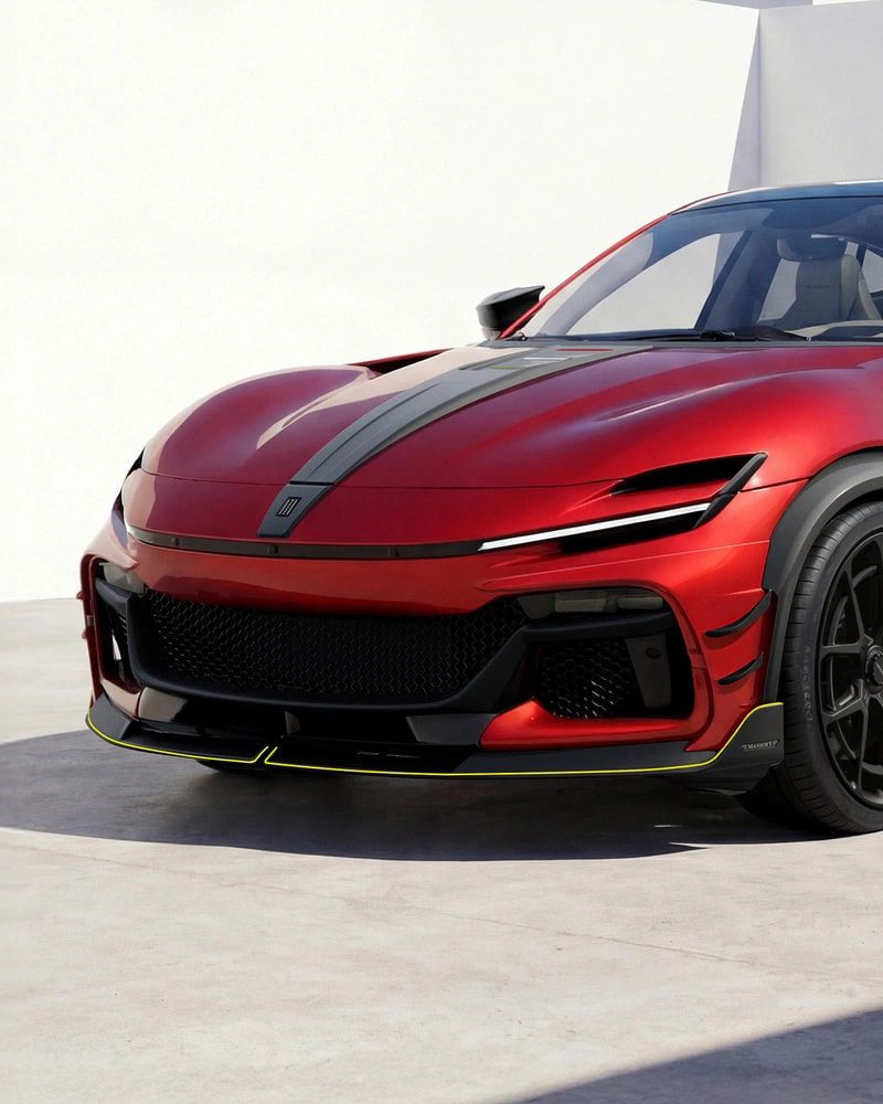 نمای نزدیک عقب خودرو با اگزوزهای چهارگانه و دیفیوزر فیبر کربنی