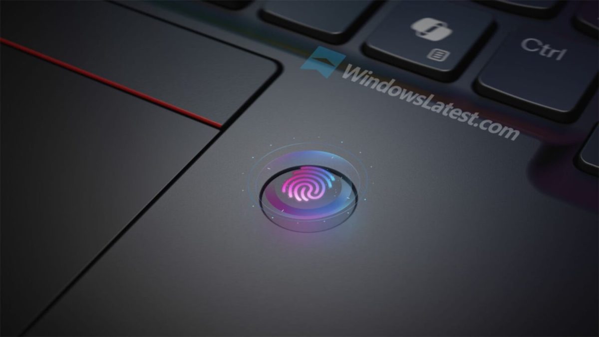 نمای نزدیک از بخش تاچپد ThinkPad X13 Detachable با حسگر اثر انگشت یکپارچه، سطح مات مشکی و خط قرمز کلاسیک ThinkPad در کنار صفحهکلید، با تمرکز بر طراحی صنعتی و امنیت سختافزاری.