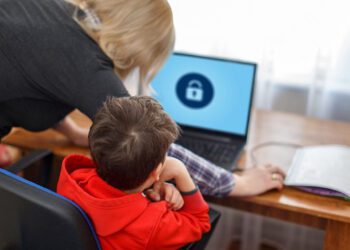 Mother locking on computer for son, parental control