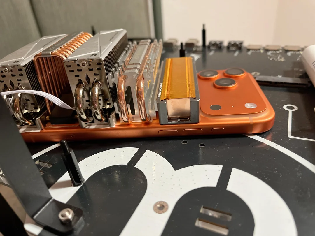 Monstrous SSD cooling solution strapped to iPhone 17 Pro Max