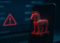 یک رندر از اسب تروجان (Trojan Horse) به رنگ قرمز روی صفحه گوشی هوشمند، که در مقابل صفحه‌ی یک کامپیوتر با هشدارهای بانکی و علامت خطر قرار گرفته است.