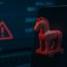 یک رندر از اسب تروجان (Trojan Horse) به رنگ قرمز روی صفحه گوشی هوشمند، که در مقابل صفحه‌ی یک کامپیوتر با هشدارهای بانکی و علامت خطر قرار گرفته است.