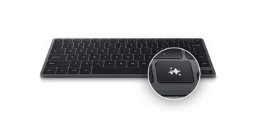 کیبورد هوشمند سامسونگ (Samsung Smart Keyboard) با کلیدهای خاکستری تیره، که یک کلید برجسته با آیکون ستاره‌های درخشان (احتمالاً برای هوش مصنوعی یا میانبرهای خاص) را نشان می‌دهد.