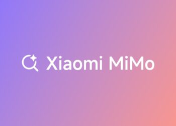 لوگوی سفید "Xiaomi MiMo" با یک آیکون جستجو/ستاره بر روی یک پس‌زمینه گرادیانتی بنفش و نارنجی.