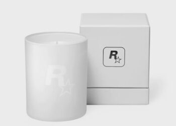 یک شمع سفید مات با لوگوی R* (Rockstar Games) و یک جعبه‌ی مکعبی سفید که لوگوی R* روی آن قرار دارد.