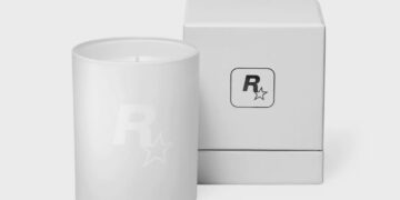 یک شمع سفید مات با لوگوی R* (Rockstar Games) و یک جعبهی مکعبی سفید که لوگوی R* روی آن قرار دارد.