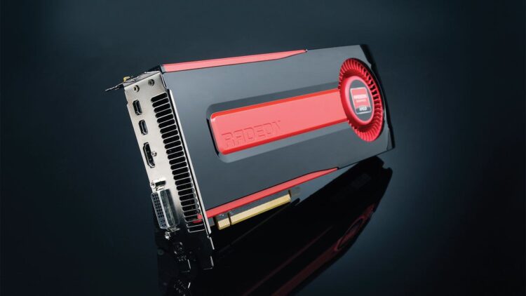 نمای نزدیک از یک کارت گرافیک قدیمی AMD Radeon با بدنه مشکی و خطوط قرمز.