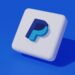 آیکون سه بعدی و مینیمال لوگوی پی‌پل (PayPal) با سایه‌پردازی روی پس‌زمینه آبی.