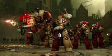 گروهی از سربازان زره‌پوش علمی–تخیلی در حال پیشروی گروهی در شهر صنعتی ویران با معماری گوتیک، همراه با واحدهای مکانیزه سنگین و فضای جنگی تیره در Total War: Warhammer 40,000