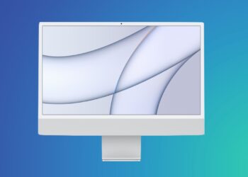 نمای روبروی آی‌مک نقره‌ای با والپیپر انتزاعی روشن.