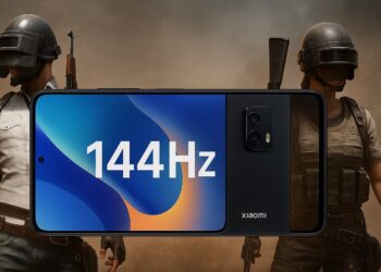 گوشی هوشمند شیائومی با نوشته ۱۴۴ هرتز روی صفحه و پس‌زمینه بازی اکشن.