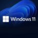 لوگوی Windows 11 در مقابل یک پس‌زمینه آبی تیره و موج‌دار.