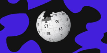 طرح گرافیکی با پس‌زمینه تیره و اشکال انتزاعی آبی و بنفش که لوگوی کروی و پازلی ویکی‌پدیا را در مرکز نشان می‌دهد