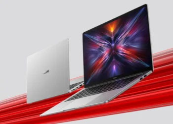 نمای رسمی لپتاپ Xiaomi Redmi Book 16 مدل 2025 با طراحی مینیمال نقرهای، بدنه باریک و نمایش گرافیک انتزاعی رنگارنگ روی نمایشگر