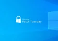 تصویر گرافیکی رسمی Microsoft Patch Tuesday با لوگوی ویندوز روی پسزمینه آبی، نماد انتشار بهروزرسانی امنیتی ماهانه مایکروسافت برای Windows و سازمانها