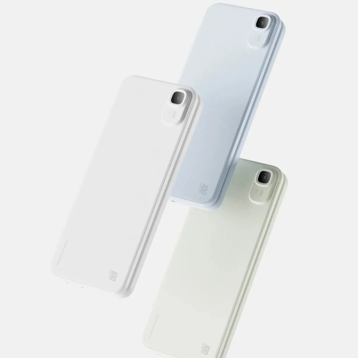 سه دستگاه تبلت/لپ‌تاپ مفهومی باریک در رنگ‌های سفید، آبی و سبز ملایم با لنز دوربین تکی.