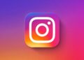 لوگوی رنگارنگ اینستاگرام با پس‌زمینه گرادینت بنفش، صورتی و زرد.