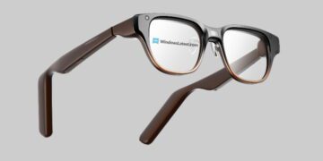 نمای مفهومی عینک هوشمند Lenovo AI Glasses با فریم تیره و دسته‌های ضخیم، نمایش اجزای الکترونیکی داخلی در بازوها و طراحی سبک عینک طبی روی پس‌زمینه خنثی