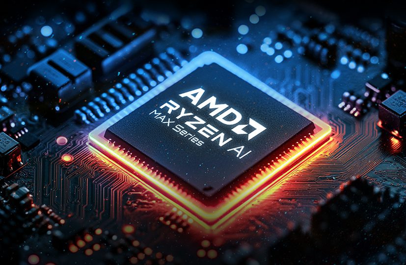 نمای نزدیک از تراشه AMD Ryzen AI Max Series نصب شده بر روی برد الکترونیکی با نورپردازی نارنجی.