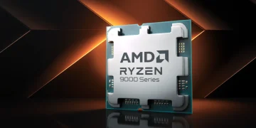 رندر تبلیغاتی از پردازنده AMD Ryzen 9000 Series با نمای روبه‌رو، شامل هیت‌اسپردر فلزی نقره‌ای با لوگوی AMD و Ryzen، قرارگرفته روی برد سبز رنگ. پس‌زمینه تیره با خطوط نور نارنجی مورب، بر قدرت پردازشی، طراحی مدرن و تمرکز بر کارایی نسل جدید پردازنده‌های AMD تأکید دارد.