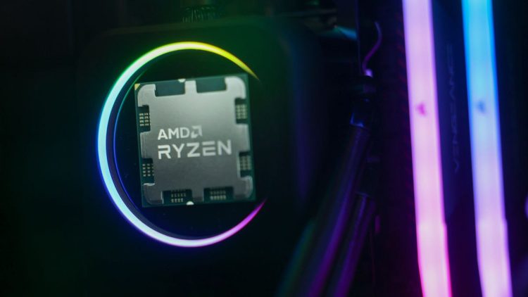 نمای نزدیک از پردازنده AMD Ryzen نصب شده روی سیستم با نورپردازی رنگی دایره‌ای.