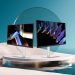 دو مانیتور BenQ سری MA روی یک سکوی دایره‌ای در محیطی فانتزی.