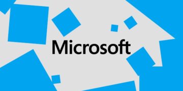 لوگوتایپ کلمه Microsoft به رنگ مشکی در میان چندین مربع آبی‌رنگ با اندازه‌های مختلف در یک پس‌زمینه خاکستری.