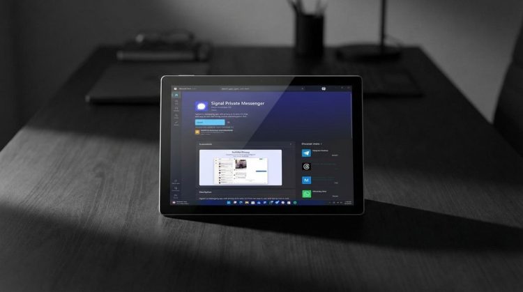 یک تبلت روی میز که صفحه اپلیکیشن Signal Private Messenger را در محیط مایکروسافت استور نشان میدهد.