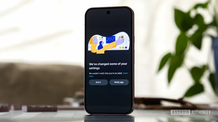 یک گوشی هوشمند که پیامی مبنی بر عدم امکان تایید سن کاربر و دکمه‌ای برای «تایید سن» (Verify age) را روی صفحه نشان می‌دهد.