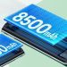 نمای گرافیکی از دو باتری بزرگ با ظرفیت‌های 8000mAh و 8500mAh که بر روی بدنه داخلی یک گوشی هوشمند قرار گرفته‌اند.