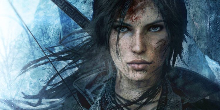 نمای نزدیک هنری از یک صحنه بازی Tomb Raider در فضای سرد و برفی با تونالیته آبی، که تجهیزات بقا، بافت لباس و عناصر ماجراجویانه در مرکز توجه قرار دارند؛ ترکیببندی تصویر بر اتمسفر خشن، چالشبرانگیز و داستانمحور یک بازی ویدیویی تمرکز دارد.