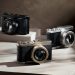 سه دوربین کامپکت Lumix با طراحی فلزی و لنز Leica روی سطوح پله‌ای در نورپردازی استودیویی.