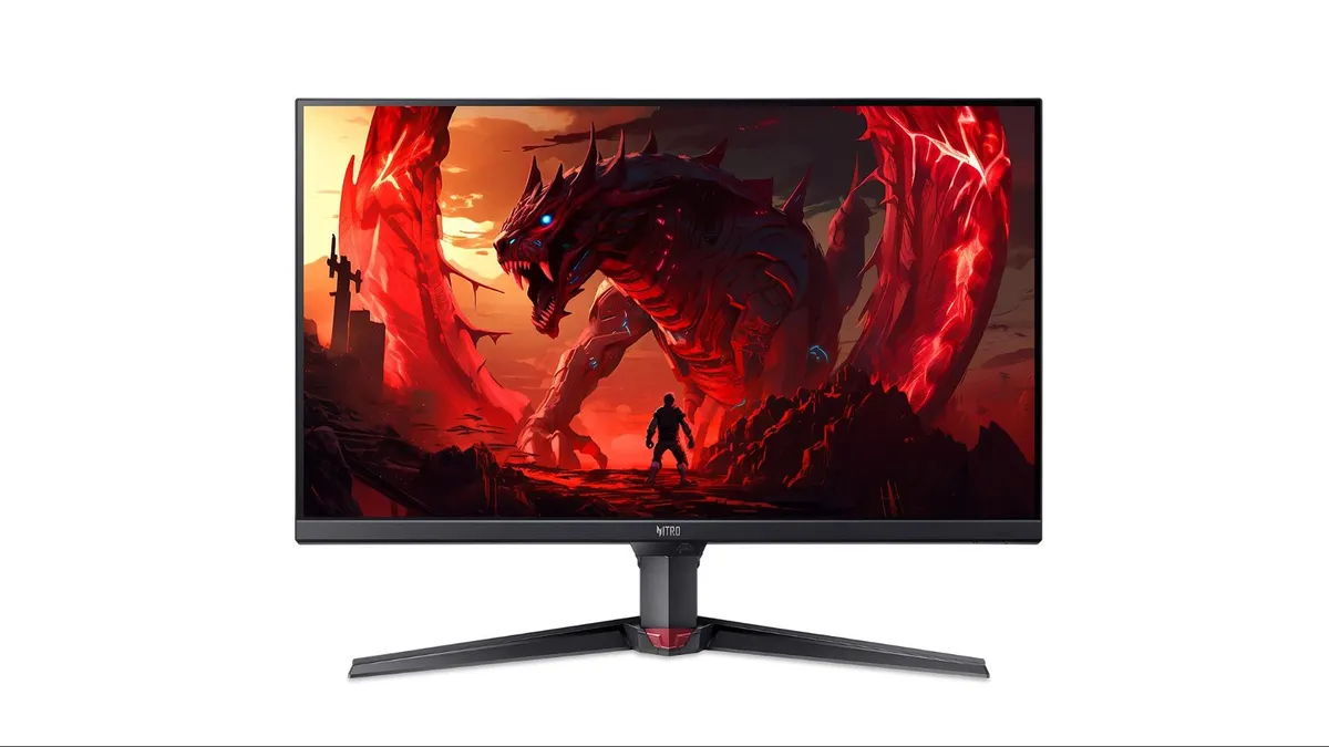 نمای روبرویی از مانیتور گیمینگ Acer Nitro با پایه مشکی و جزئیات قرمز، در حال نمایش تصویر پسزمینه اژدها و مبارز