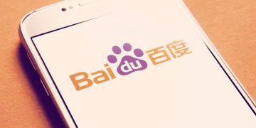لوگوی Baidu روی صفحه نمایش یک گوشی هوشمند، نماد برند موتور جست‌وجو و فناوری چینی بایدو.
