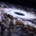 تصویرسازی هنری از سیاهچاله کلانجرم Sagittarius A* در مرکز کهکشان راه شیری با دیسک برافزایشی درخشان و ابرهای گازی پیرامون آن.