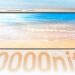 نمای روبهرو از پنل نمایشگر Honor X80 Pro Max که با والپیپر ساحلی روشن شده و عدد ۱۰,۰۰۰ نیت (10000 nits) به عنوان حداکثر روشنایی نمایشگر در پایین آن درج شده است