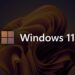 لوگوی چهارپنجرهای و عبارت “Windows 11” روی پسزمینهای تیره با طرح سهبعدی طلایی؛ نشان Neowin در گوشه پایین تصویر دیده میشود